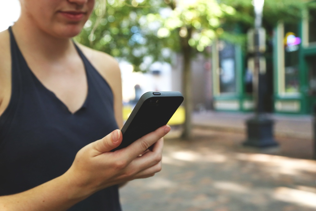 woman watching phone